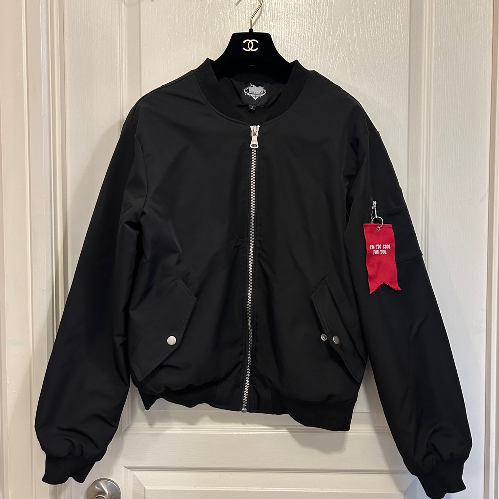 Black Bomber Jacket with Red Tag